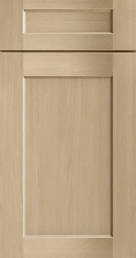 Honey-finished shaker-style cabinet doors with recessed panels and natural wood grain