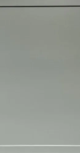 Sage green cabinet door with clean edges and professional finish